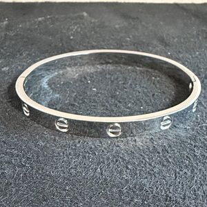 Designer Inspired Clip On Silver-Tone Bangle